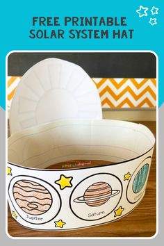 a paper plate with solar system on it and the text free printable solar system hat