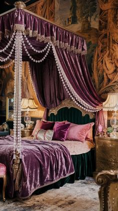 a bed with purple sheets and pillows in a room