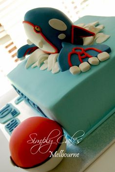 a blue cake with an octopus on it