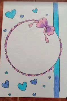 a card with hearts and a bow on it, in the shape of a circle