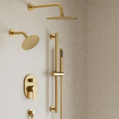 an image of a bathroom setting with gold shower faucet and soap dispenser