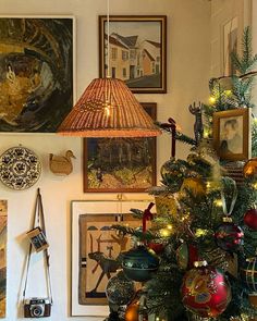 a christmas tree with ornaments and lights on it