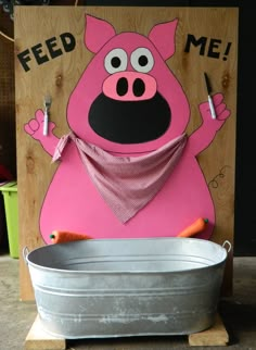 a metal tub with a pink pig on it