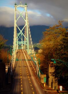 a long bridge that is going over some water