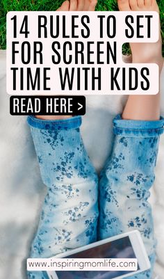 a person laying on the grass with their feet up and text that reads, 4 rules to set for screen time with kids read here