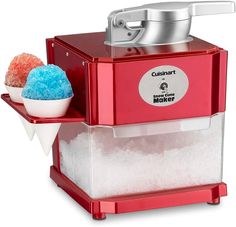 a red ice cream maker sitting on top of a counter