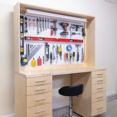 a workbench with lots of tools on it