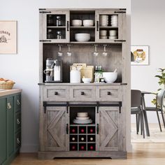 an open cabinet with dishes and wine glasses on it in a room that has hardwood floors