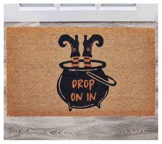 a door mat that says drop on in