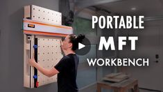 a woman is working on a workbench with the words portable mft in front of her