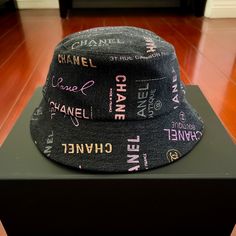 Size M, Brand New, Never Worn, Tag Still Attached Comes With Chanel Box Designer Black Spring Hats, Designer Black Hats For Spring, Designer Bucket Hat For Spring, Luxury Black Hat For Spring, Designer Black Brimmed Hat, Designer Black Bucket Hat, Designer Black Summer Hats, Chanel Denim, Chanel Box