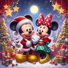 two mickey and minnie mouses standing next to each other in front of christmas trees