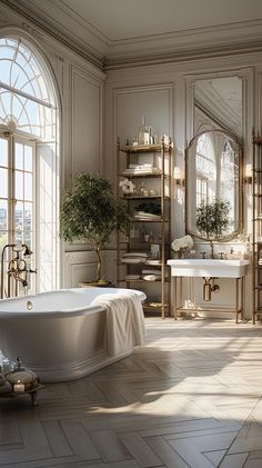 an elegant bathroom with large windows and white tub in the center, surrounded by gold trimming