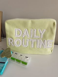 Refresh your travel bag lineup with our new favorite Daily Routine XL makeup bag! Daily Routine pearl patches sewn on our lime terry cloth bag Terry cloth exterior, lined with a nylon interior for easy cleaning Dimensions: 11 x 5 x 8 inches Ships immediately! Terry Cloth Bag, Christmas In July Sale, Brunch Dress, Travel Cases, Toiletry Kit, Shoes For Leggings, Cloth Bag, Night Routine, Gift Stickers