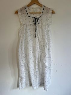 Vintage Dream Away Nightgown Dress Measured with item laid flat. Shoulder: 14" Waist: 24" Length: 39" Bust: 18" Flare: 28"   Color: white, grey  Fabric: 65% polyester, 35% cotton  Foreign Size: US S Clothing size: small   Condition: good. Light wear throughout, no flaws noted    Due to the nature of vintage clothing, all items have been described and all sales are final. Summer Cotton Nightgown For Overnight Wear, White Ruffled Nightgown For Sleepover, White Ruffled Sleep Dresses, White Spring Nightgown For Sleep, White Ruffled Sleepwear For Loungewear, White Sleeveless Ruffled Sleepwear, White Ruffled Sleepwear, White Cotton Sleepwear With Ruffles, White Sleepwear With Ruffles