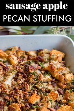 sausage apple pecan stuffing in a white casserole dish with text overlay