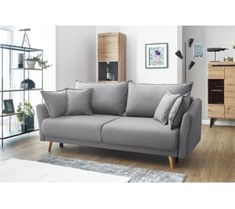 a living room scene with focus on the couch