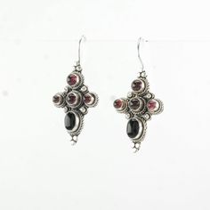 "These vintage sterling silver earrings are 1 3/16\" inches long, and 3/4\" inch wide The earrings weigh 5.9 Grams The Stone/Theme is Purple Garnet Cross Natural Size/Stone measurement (if any) are 6.5 x 4.6 mm Markings: 925, (Tested Sterling Silver guaranteed to be so) The condition of the earrings is Estate, Great some scratches, light patina Extra Note:  1990 More unique vintage Silver earrings: https://www.etsy.com/shop/SilverStarrs925?section_id=13899305 NOTE: Variations in color in the pic Purple Sterling Silver Teardrop Dangle Earrings, Silver Garnet Dangle Earrings, Silver Amethyst Earrings With Multi-stone, Vintage Silver Earrings, Purple Multi-stone Sterling Silver Earrings, Purple Multi-stone Dangle Earrings, Cross Earrings, Vintage Sterling Silver, Unique Vintage