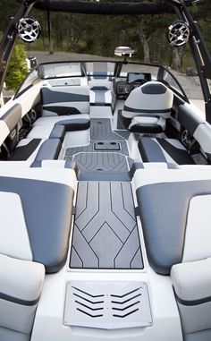 the interior of a white and gray boat