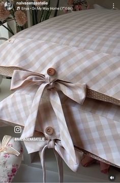 a pillow with a bow tied around it