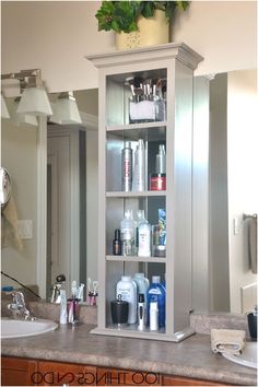 a bathroom cabinet with lots of personal care products