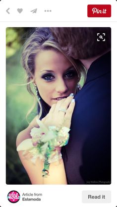 a man and woman embracing each other with their hands on their chest, wearing wedding rings