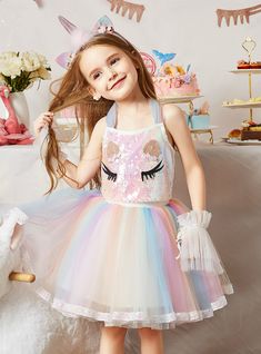 Make your girl look different form the others with this unicorn dress from Kemedress.com. this dress has a charming appeal that will catch the eye of the guests and they won't be able to help but to admire the innocence of the princess in this adorable dress. the rainbow-colored dress has a halter neckline it has two pieces, a top and a bottom skirt. The top of the dress is embellished with colorful sequins that form a colorful kaleidoscope. The skirt of the dress sis made up of rainbow-colored tulle that give it a characteristic unicorn feel. Your little girl will love to wear this dress. Rainbow Sequin Dress, Rainbow Costumes, Sequin Halter Top, Gonna In Tulle, Girls Costumes, Pink Two Piece, Unicorn Dress, Girl Princess Dress, Rainbow Dress