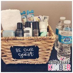 a basket filled with personal care items next to a bottle of water