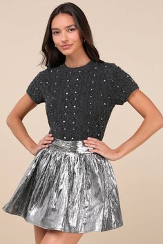 Your 'fits will always be spotlight-stealing in the Lulus Celebrated Shine Silver Metallic Mini Skirt! Shiny metallic fabric boasts a luxe pleat-like crinkled design as it shapes this party-approved skirt that has a high, banded waist and a playful, skater silhouette. Hidden zipper/clasp at back. Fit: This garment fits true to size. Length: Mid-thigh. Size medium measures 16" from waist to hem. Waist: Fitted - very fitted at natural waist. Hip: Not Fitted - fuller skirt allows room for hips. Fab Silver Metallic Skirt, Metallic Mini Skirt, Dressy Attire, Mini Skater Skirt, Buy Skirts, Chic Skirts, Metallic Skirt, Metallic Fabric, Skirts Online