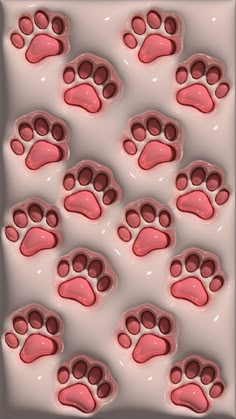 an animal's paw prints are shown in pink and white, as well as the background