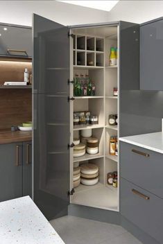 an open pantry in the middle of a kitchen