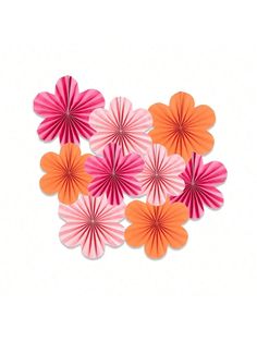 pink and orange paper flowers on a white background