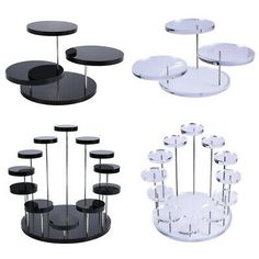 four tiered tables with black and clear glass tops on each side, all in different sizes