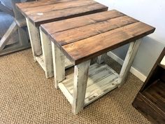 two wooden tables sitting on top of a carpeted floor