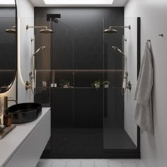 a black and white bathroom with a skylight above the shower stall, sink and mirror