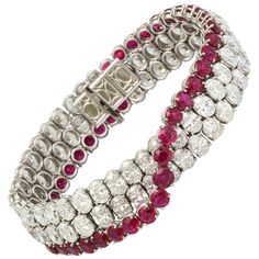 This red carpet worthy bracelet is one of the finest that you will ever see. The combination of round rubies and oval diamonds represents an exquisite taste level and the wonderfully supple platinum mounting is unmatched in quality. The unique design itself is subtle, yet powerful. The crossing of the rubies from one side of the bracelet to the other is a masterpiece of minimalist chic. When worn, the superior flexibility allows for the brilliance of the diamonds and the deep red of the rubies t Chic Minimalista, Burmese Ruby, Ruby Bracelet, Modern Bracelets, Bracelets Gold Diamond, Stylish Bracelet, Bracelet Design, Expensive Jewelry, A Bracelet