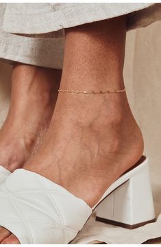 Elevate your everyday looks with a delicate chain anklet playfully punctuated with flattened links for a subtle dimensional twist. 9 1/4" length 14k-gold fill Made in the USA Phone Items, Gold Anklet, Delicate Chain, Chain Anklet, Anklet Jewelry, Pretty Jewellery, Cute Jewelry, Everyday Look, Gold Chains