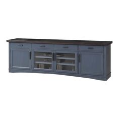 an entertainment center with two doors and drawers