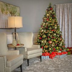 a decorated christmas tree in a living room