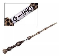 an animal print baseball bat with the number six on it