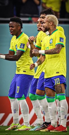 the soccer players are congratulating each other