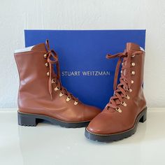 Brand New In Box Suart Weitzman Kolbie Cognac Smooth Calf Leather Boots / Ankle Boots Size 10b (Standard/Medium Width) / Size Eu 40.5 The Most Lucius Perfect Cognac Brown Leather And Laces, With Brass Chain Accent Around The Black Soles. Brass Hardware Includes Dust Cover Bag, Original Box, And All Original Packaging. Perfect Brand New Condition! Leather Boots Ankle, Calf Leather Boots, Boots Cognac, Boots Ankle, Brass Chain, Dust Cover, Brass Hardware, Leather Ankle Boots, Brown Gold