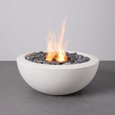 A Bioethanol Powered Fire Table: An elegant, compact design, ideal for smaller gathering places.. Brilliant Golden Flames: Fired by our exclusive bioethanol burner.. Compact Modern Aesthetic: Elegant, compact styling - ideal for smaller spaces, terraces, balconies or courtyards.. TerraFlame 30-in x 30-in Bio-ethanol Fireplace in White | BIOE-HSTA30-WHT-K Fire Pit Cooking, Outdoor Fire Table, Outdoor Fireplace Designs, Cool Fire, Ethanol Fireplace, Bioethanol Fireplace, Fire Pit Bowl, Concrete Fire Pits, Environmental Concerns