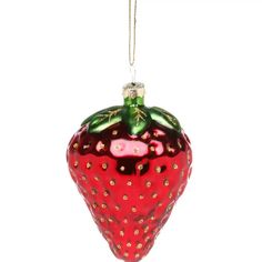 a glass ornament with a strawberry on it