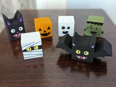 some paper bats are sitting on a table