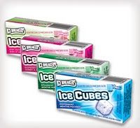 three boxes of ice cubes sitting next to each other