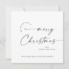 a white christmas card with the words merry christmas and happy new year