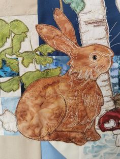 a painting of a brown rabbit sitting next to a tree with leaves on it's back