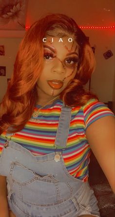 a woman with red hair wearing overalls and makeup