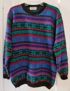 Vintage 1980s Alfred Dunner Snowflake Print Knit Sweater Women's Large. This vintage women's sweater by Alfred Dunner is perfect for someone who loves the 1980s and 1990s, loves coogi or "cosby" sweaters but wants a good price point, and/or someone in the holiday spirit.  Sweater has a black collar, hem, and cuffs, with a horizontal green and teal snowflake pattern amid red and purple stripes.  In great condition, was rarely worn and stored carefully. Size Large.  Measurement Vintage Acrylic Sweater For Winter, Vintage Multicolor Acrylic Sweater, Cosby Sweater, 80s Sweater, Trendy Sweaters, Alfred Dunner, Knitting Women Sweater, Green Sweater, Vintage Sweaters